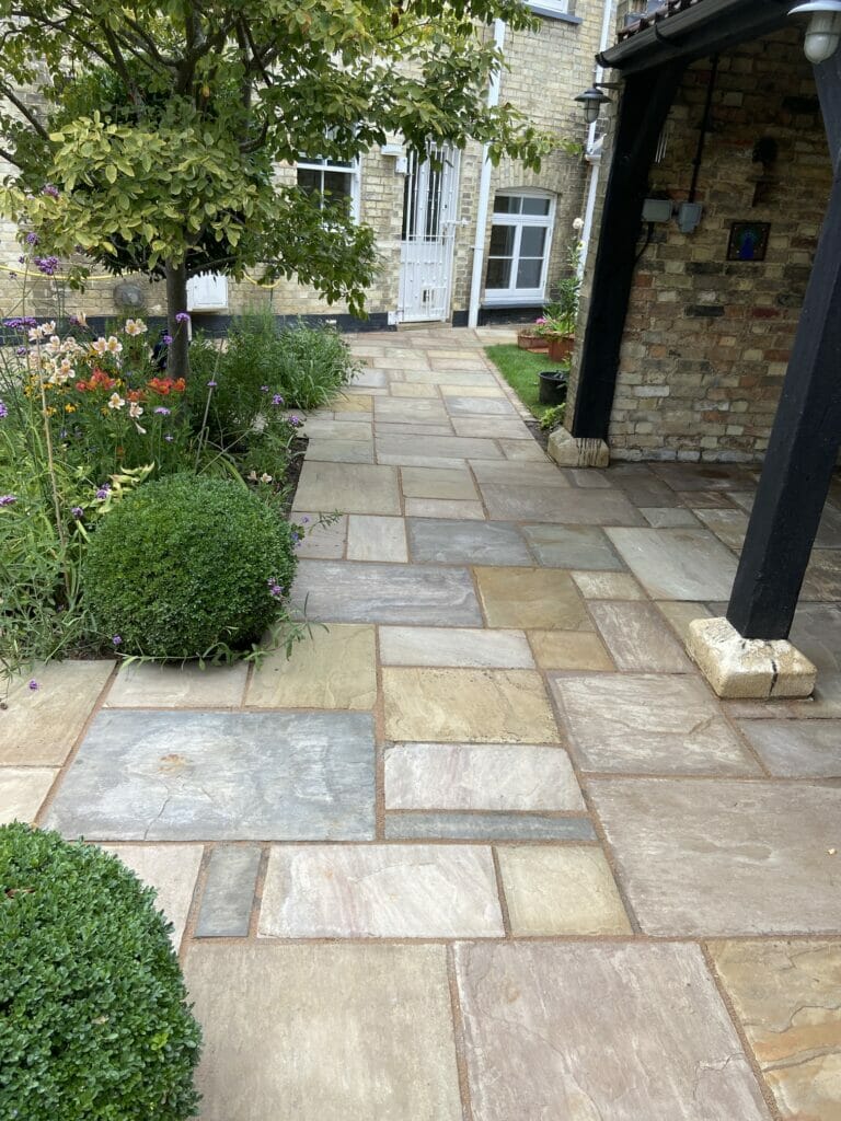 What's the best way to clean an Indian sandstone patio?