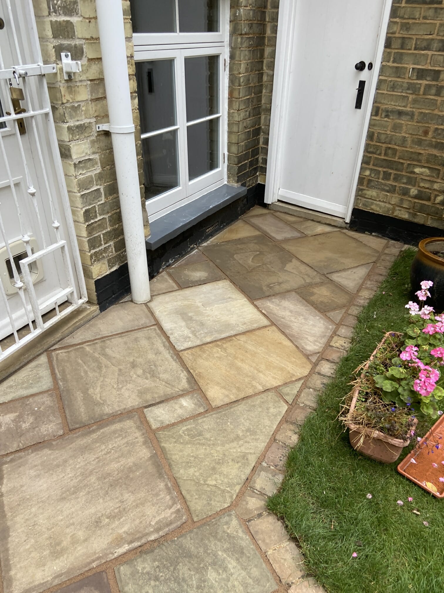 What's the best way to clean an Indian sandstone patio?