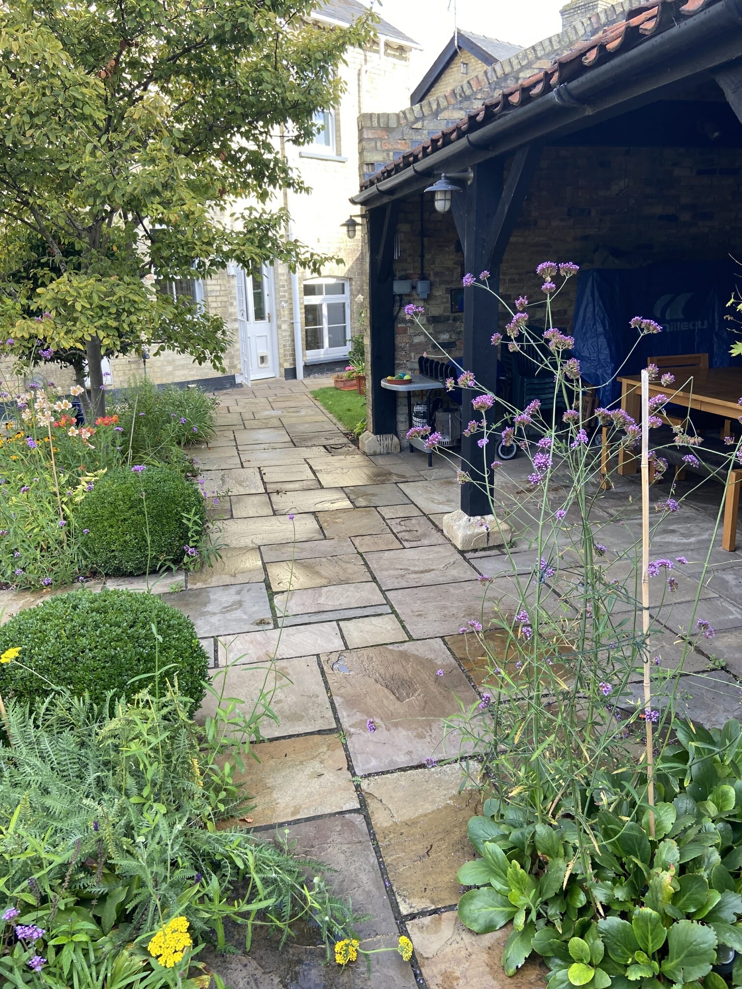 What's the best way to clean an Indian sandstone patio?
