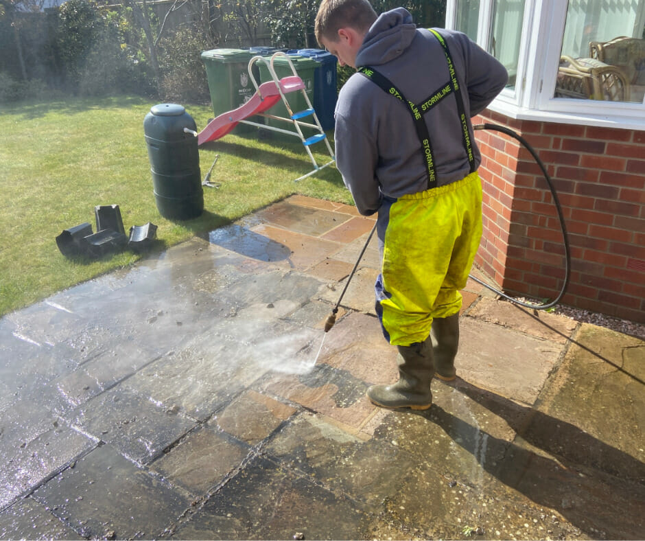 What causes rust stains on a concrete patio & driveway?